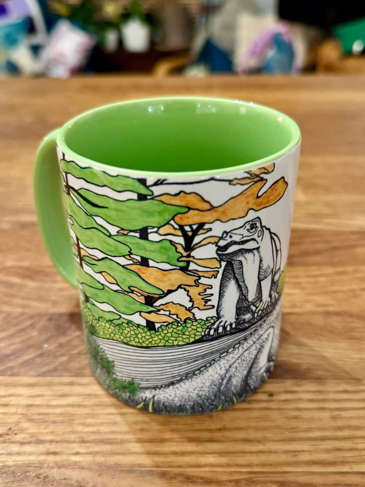 Green Crystal Palace dinosaur mug - iguanodons